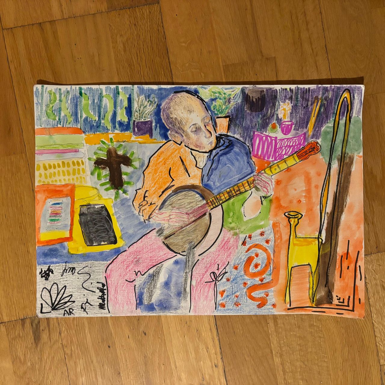 A colourful painting of me playing the banjo that my friends did at a party